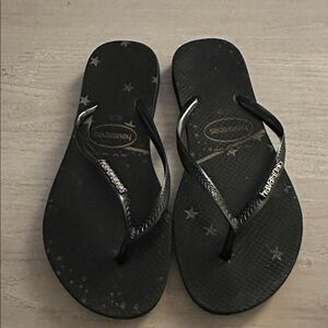 HAVAIANAS Black Flip Flops with Star Design